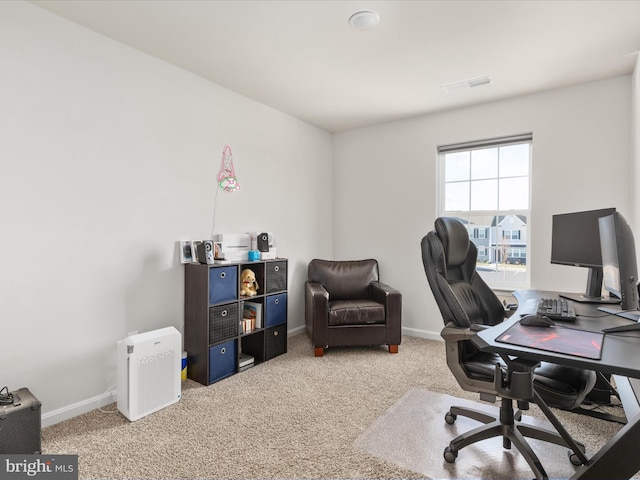 office with carpet, baseboards, and visible vents