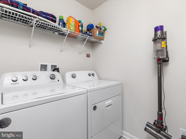 washroom featuring laundry area and independent washer and dryer