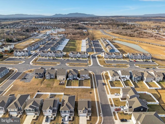 birds eye view of property featuring a residential view and a mountain view