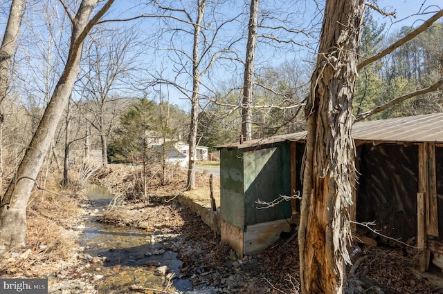 view of outbuilding with an outbuilding