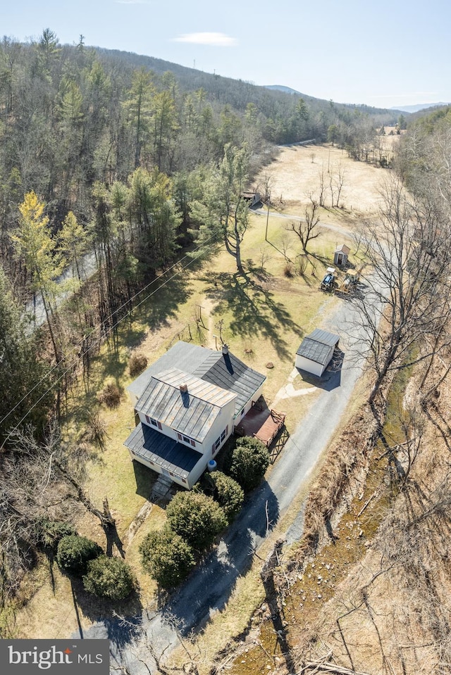 drone / aerial view with a forest view