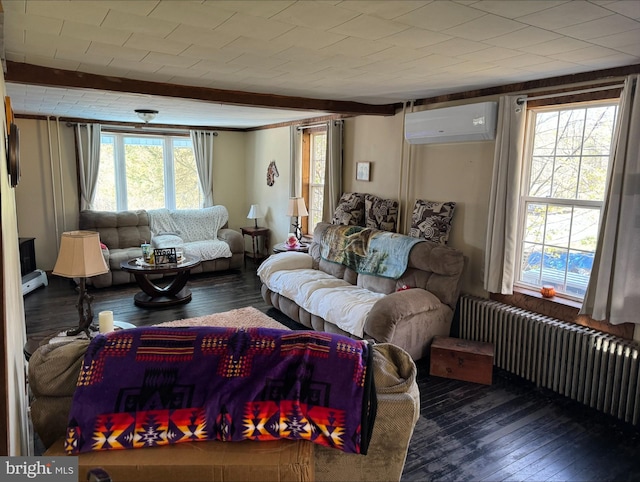 living room featuring radiator heating unit, beam ceiling, an AC wall unit, and wood finished floors