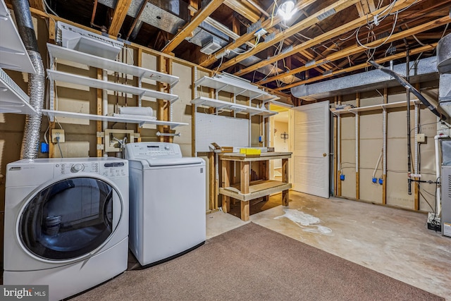 washroom with washing machine and dryer