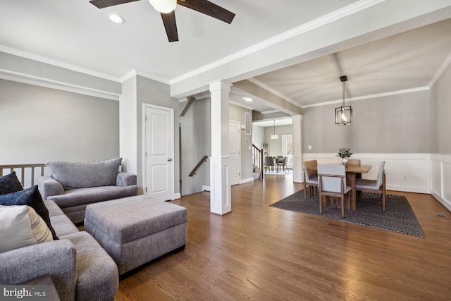 living room featuring a wainscoted wall, crown molding, recessed lighting, a ceiling fan, and wood finished floors