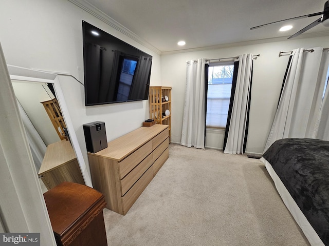 bedroom with recessed lighting, light carpet, crown molding, and baseboards