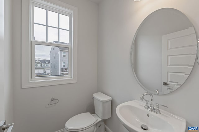 bathroom with a sink and toilet