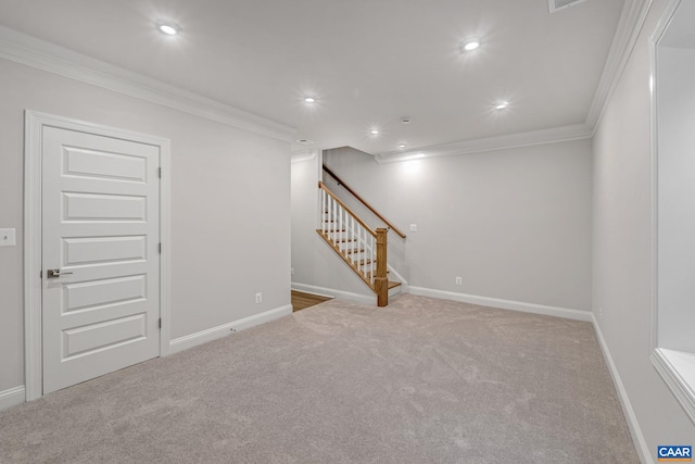 basement with ornamental molding, recessed lighting, light colored carpet, and stairway