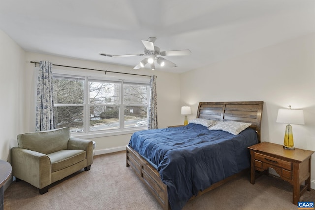 bedroom with light carpet, visible vents, baseboards, and ceiling fan