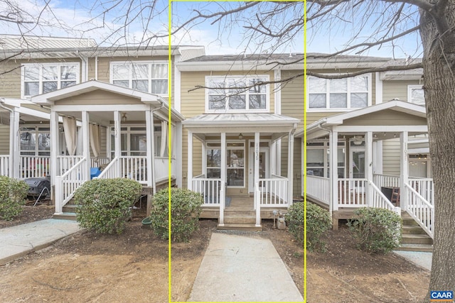 townhome / multi-family property with a sunroom