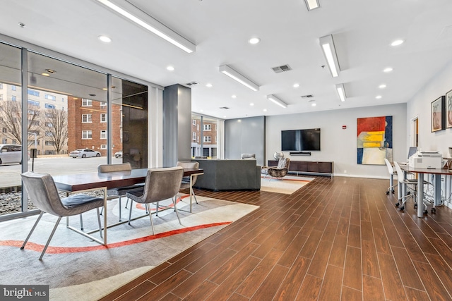 dining room featuring recessed lighting, visible vents, and wood finished floors