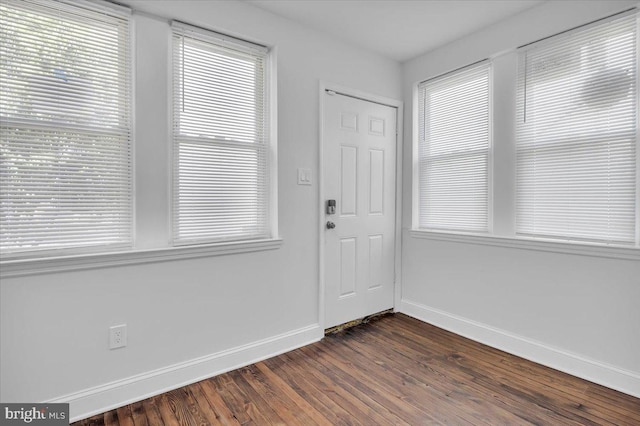 2782 Yorkship Rd, Camden, NJ 08104 - foyer with baseboards and dark wood-style flooring