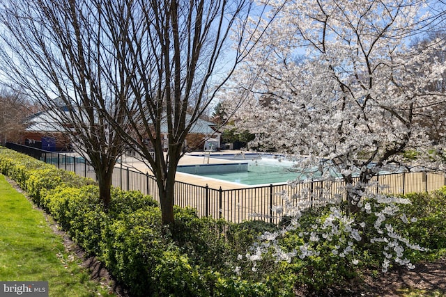 pool featuring fence