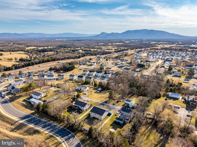 birds eye view of property with a residential view and a mountain view