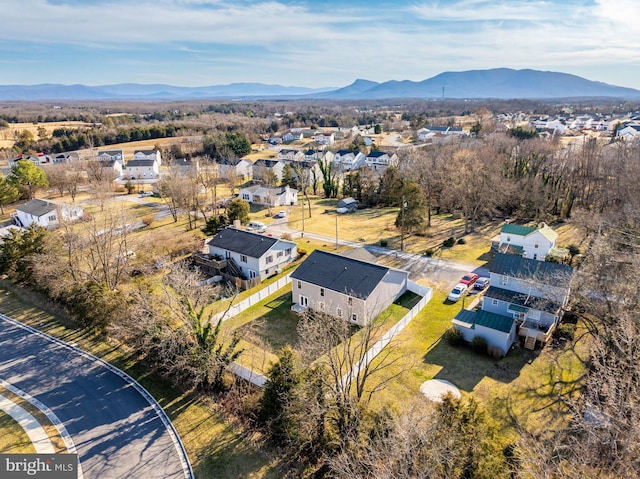 birds eye view of property featuring a residential view and a mountain view