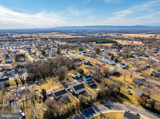 birds eye view of property with a residential view and a mountain view