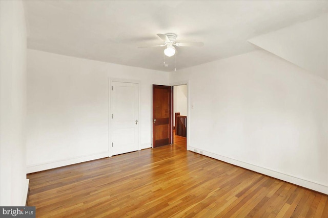 interior space featuring ceiling fan and wood finished floors