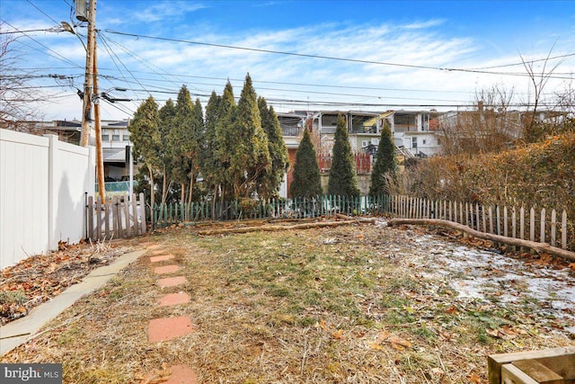 view of yard with fence