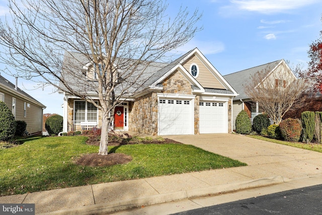 view of front facade featuring a porch, a garage, stone siding, concrete driveway, and a front lawn