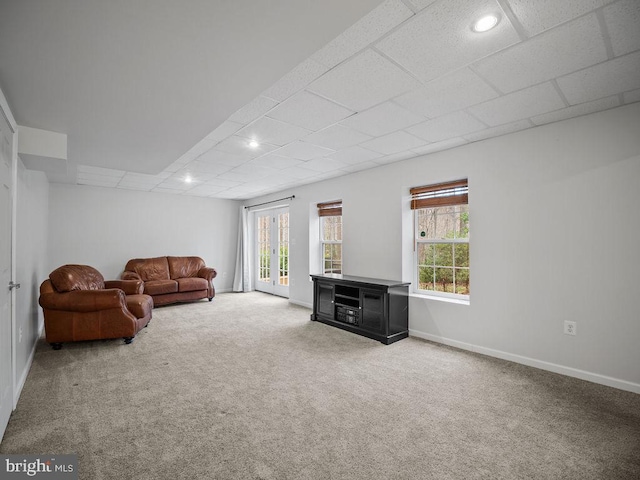 3110 Blackberry Ln, Prince Frederick, MD 20678 - living area with a paneled ceiling, baseboards, carpet flooring, and a fireplace