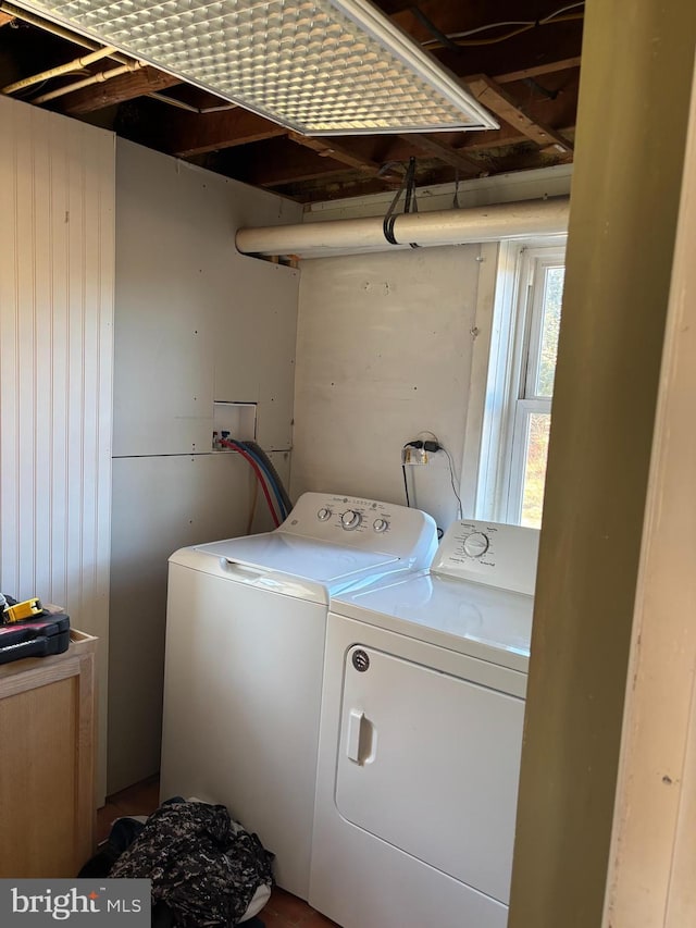 laundry room featuring laundry area and separate washer and dryer