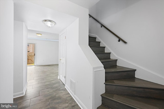 7349 Eldorado Ct, Mclean, VA 22102 - stairway featuring baseboards and wood finished floors
