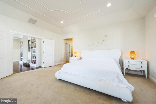 bedroom featuring carpet, visible vents, and recessed lighting