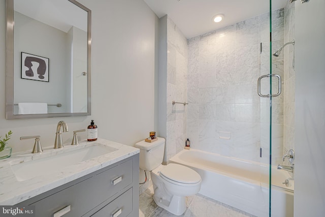 bathroom with toilet, shower / bathtub combination, and vanity