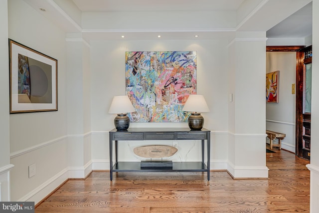 room details with baseboards and wood finished floors