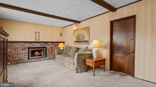 living area featuring a textured ceiling, light colored carpet, visible vents, a brick fireplace, and beam ceiling