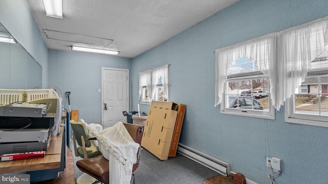 interior space featuring a baseboard radiator and plenty of natural light