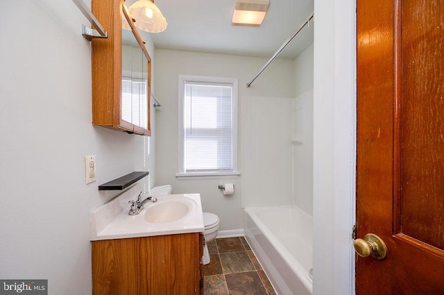 bathroom with visible vents, toilet, stone finish floor, vanity, and  shower combination