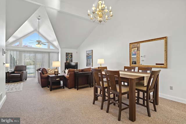 dining room with light carpet, high vaulted ceiling, and ceiling fan with notable chandelier