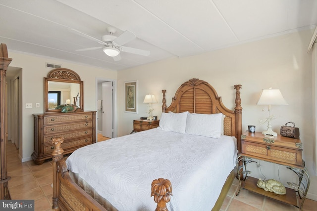 bedroom with visible vents, ceiling fan, baseboards, and light tile patterned flooring