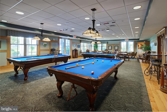 playroom featuring light wood-type flooring, visible vents, billiards, and a paneled ceiling