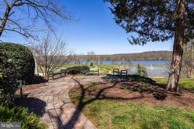 exterior space with a water view