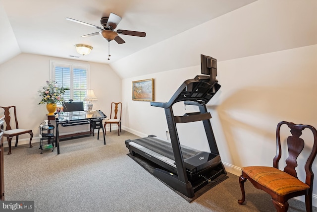 exercise room featuring vaulted ceiling, carpet flooring, baseboards, and a ceiling fan