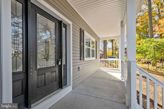 property entrance with a porch