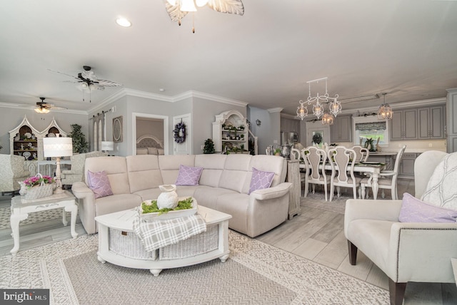 living room featuring ornamental molding, recessed lighting, light wood-style flooring, and a ceiling fan