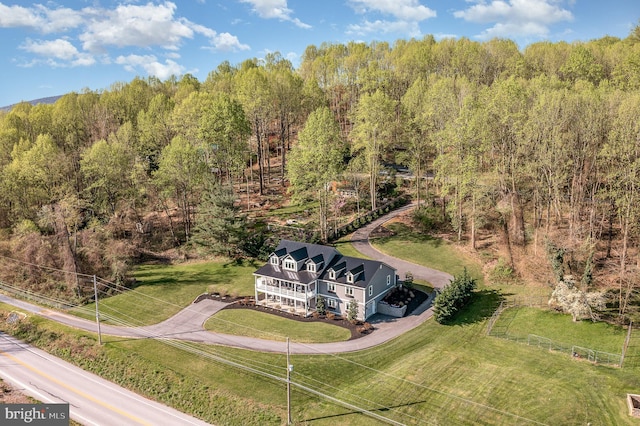 aerial view featuring a view of trees