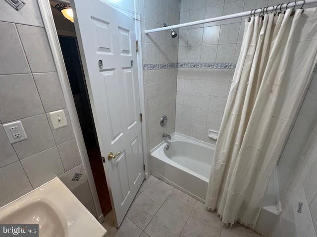 508 Garden Way, Mount Laurel, NJ 08054 - full bath featuring tile walls, tile patterned floors, and shower / bath combination with curtain