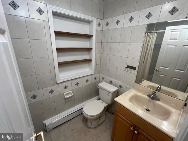 508 Garden Way, Mount Laurel, NJ 08054 - bathroom with baseboard heating, tile patterned floors, vanity, tile walls, and toilet