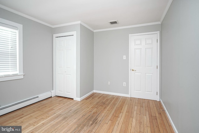 508 Garden Way, Mount Laurel, NJ 08054 - unfurnished bedroom featuring light wood finished floors, visible vents, ornamental molding, a baseboard heating unit, and baseboards
