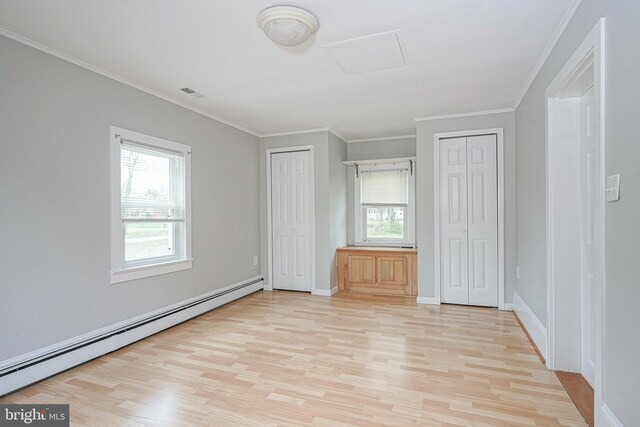 508 Garden Way, Mount Laurel, NJ 08054 - unfurnished bedroom featuring light wood finished floors, attic access, baseboard heating, and two closets