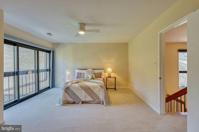 bedroom featuring carpet flooring, a ceiling fan, baseboards, and access to outside