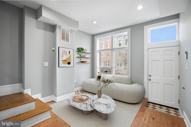 sitting room featuring a wealth of natural light, wood finished floors, visible vents, and recessed lighting