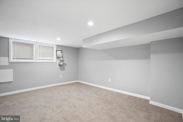 finished basement with carpet floors, recessed lighting, and baseboards