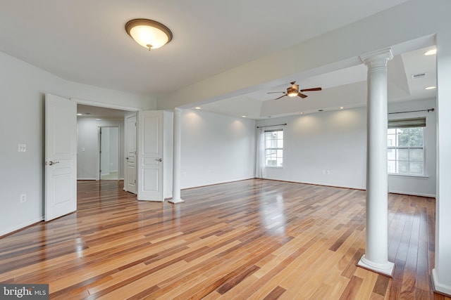 16309 Sandy Ridge Ct, Woodbridge, VA 22191 - spare room featuring decorative columns, plenty of natural light, light wood finished floors, a ceiling fan, and recessed lighting