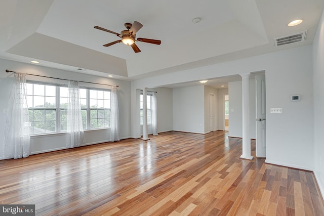 16309 Sandy Ridge Ct, Woodbridge, VA 22191 - unfurnished room with a raised ceiling, a ceiling fan, healthy amount of natural light, light wood-type flooring, and recessed lighting