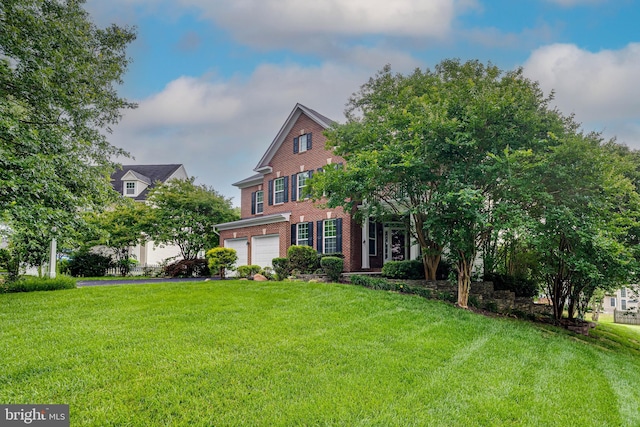 16309 Sandy Ridge Ct, Woodbridge, VA 22191 - view of front of property featuring brick siding, a garage, a front yard, and driveway