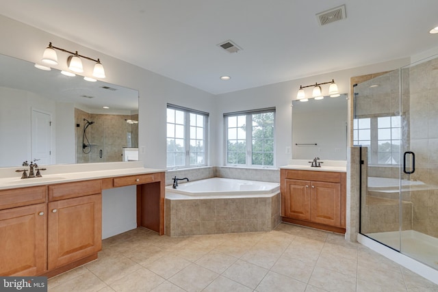 16309 Sandy Ridge Ct, Woodbridge, VA 22191 - bathroom featuring tile patterned flooring, a stall shower, a garden tub, two vanities, and recessed lighting